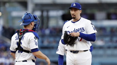 Los Angeles Dodgers' Blake Snell, right, gets a visit from catcher Will Smith during the second inning of a baseball game against the Atlanta Braves Wednesday, April 2, 2025, in Los Angeles. (AP Photo/Kevork Djansezian)