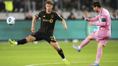 Inter Miami forward Lionel Messi, right, kicks past Los Angeles FC forward Nathan Ordaz during the first half of an MLS soccer match, Wednesday, April 2, 2025, in Los Angeles. (AP Photo/Mark J. Terrill)