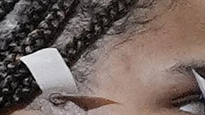 UConn guard Paige Bueckers, center, and guard Paige Bueckers react on stage during the trophy ceremony after defeating South Carolina in the national championship game at the Final Four of the women's NCAA college basketball tournament, Sunday, April 6, 2025, in Tampa, Fla. (AP Photo/John Raoux)