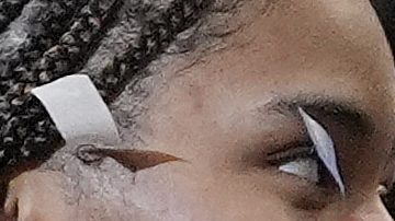 UConn guard Paige Bueckers, center, and guard Paige Bueckers react on stage during the trophy ceremony after defeating South Carolina in the national championship game at the Final Four of the women's NCAA college basketball tournament, Sunday, April 6, 2025, in Tampa, Fla. (AP Photo/John Raoux)