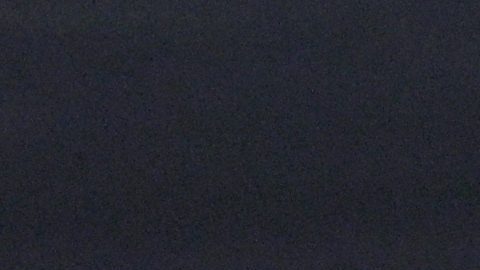 Los Angeles Lakers guard Luka Doncic (77) looks to shoot over Oklahoma City Thunder forward Kenrich Williams (34) during the first half of an NBA basketball game Sunday, April 6, 2025, in Oklahoma City. (AP Photo/Nate Billings)