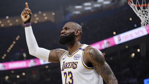 Los Angeles Lakers forward LeBron James signals that he wants a review of an official's call during the first half of an NBA basketball game against the Oklahoma City Thunder, Sunday, April 6, 2025, in Oklahoma City. (AP Photo/Nate Billings)