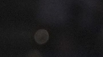 Los Angeles Lakers guard Luka Doncic, left, drives past Oklahoma City Thunder guard Cason Wallace, right, during the first half of an NBA basketball game, Tuesday, April 8, 2025, in Oklahoma City. (AP Photo/Kyle Phillips)