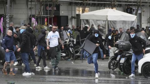 Lazio fans riot with police ahead of the Italian Serie A soccer match between Lazio and Roma at Rome's Olympic stadium, Sunday, April 13, 2025. (AP Photo/Gregorio Borgia)