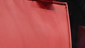 Miami Heat guard Jaime Jaquez Jr. (11) shoots in between Washington Wizards forwards Tristan Vukcevic (00) and Justin Champagnie (9) during the second half of a basketball game, Sunday, April 13, 2025, in Miami. (AP Photo/Michael Laughlin)