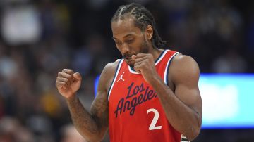 Los Angeles Clippers forward Kawhi Leonard reacts as time runs out in the second half of Game 2 of a first-round NBA playoff series against the Denver Nuggets Monday, April 21, 2025, in Denver. (AP Photo/David Zalubowski)