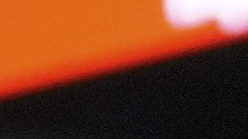 Los Angeles Lakers guard Luka Doncic (77) looks to pass as Minnesota Timberwolves forward Julius Randle (30) defends during the second half of Game 3 of an NBA basketball first-round playoff series, Friday, April 25, 2025, in Minneapolis. (AP Photo/Abbie Parr)