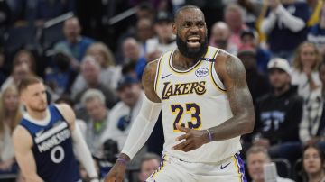 Los Angeles Lakers' Lebron James reacts after a call by a referee during the second half of Game 4 of an NBA basketball first-round playoff series against the Minnesota Timberwolves, Sunday, April 27, 2025, in Minneapolis. (AP Photo/Abbie Parr)