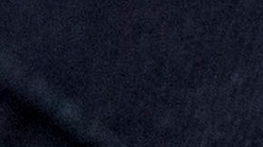 A customs agent wears a patch for the U.S. Customs and Border Protection agency, which is a part of the Department of Homeland Security, Friday, Oct. 27, 2017, at John F. Kennedy International Airport in New York. (AP Photo/Mark Lennihan)