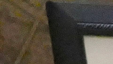 Jose H. Gomez, Archbishop of Los Angeles, sits behind an image of Pope Francis during a service in the Pope's honor at the Cathedral of Our Lady of Angels, Monday, April 21, 2025, in Los Angeles. (AP Photo/Damian Dovarganes)