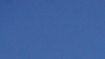 Students sit on the lawn near Royce Hall at UCLA Thursday, April 25, 2019, in the Westwood section of Los Angeles. Hundreds of students and staff at two Los Angeles universities, including UCLA, have been placed under quarantine because they may have been exposed to measles. Officials say the people affected by the order either have not been vaccinated or cannot verify that they are immune. (AP Photo/Jae C. Hong)