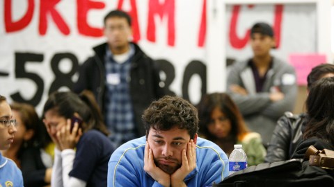 UCLA student Jose Ortiz, 20, reacts as the Dream Act fails to move forward in the Senate during televised coverage of proceedings at the UCLA Downtown Labor Center in Los Angeles, Saturday, Dec. 18, 2010. Immigrant advocates viewed the measure as a step toward providing a path to legal status for up to 12 million illegal immigrants by focusing on the most sympathetic among them first. Critics called it a back-door grant of amnesty that would encourage more illegal immigration. (AP Photo/Jason Redmond)