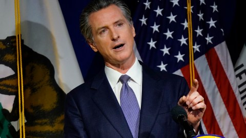 FILE - California Gov. Gavin Newsom unveils his proposed 2022-2023 state budget during a news conference in Sacramento, Calif., Monday, Jan. 10, 2022. Newsom will unveil his proposed revised 2022-2023 spending plan on Friday, May 13, 2022. (AP Photo/Rich Pedroncelli, File)