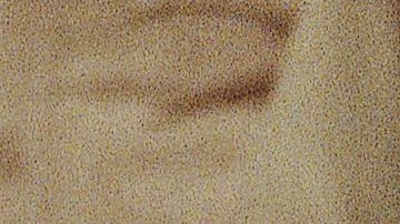 Lyle Menendez, left confers with brother Erik during a court appearance, April 2, 1991 in Beverly Hills, California. Lawyers for the brothers won another delay of a preliminary hearing while they seek a state Supreme Court opinion on whether an alleged murder confession is protected by doctor-patient privilege. (AP Photo/Kevork Djansezian)