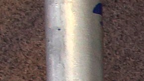 A homeless person sleeps in a sleeping bag on a New York sidewalk, Dec. 16, 2014 in New York. (AP Photo/Mark Lennihan)