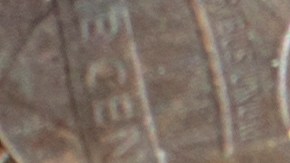 Lupa moneda de centavo