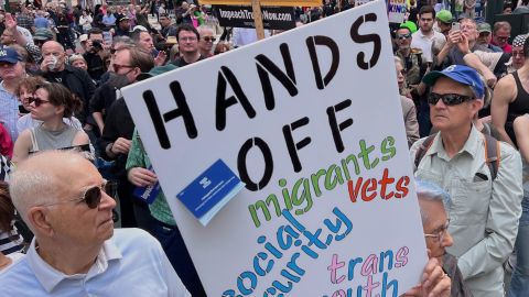 People gather to protest President Donald Trump's policies on Saturday, April 19, 2025 in New York. (AP Photo/Joseph Frederick)