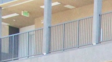 Autoridades cortan el listón de inauguración del edificio Lorena Plaza, en Boyle Heights.