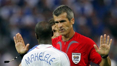 Referee Horacio Elizondo, of Argentina, talks to France Claude Makelele during the final of the soccer World Cup between Italy and France in the Olympic Stadium in Berlin, Sunday, July 9, 2006. (AP Photo/Christophe Ena) ** MOBILE/PDA USAGE OUT **