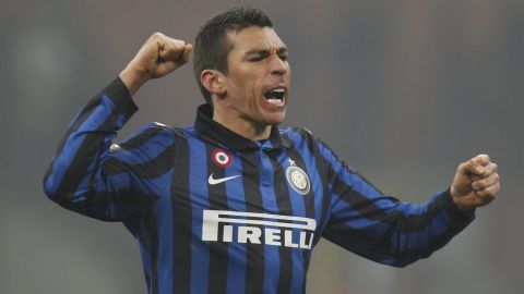 Inter Milan Brazilian defender Lucio celebrates at the end of a Serie A soccer match between AC Milan and Inter Milan, at the San Siro stadium in Milan, Italy, Sunday, Jan.15, 2012. Inter won 1-0. (AP Photo/Luca Bruno)