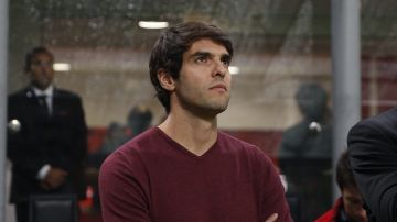 Former AC Milan's player Ricardo Kaka waits for the kick off of the Serie A soccer match between AC Milan and Roma at the Milan San Siro Stadium, Italy, Friday, Aug. 31, 2018. (AP Photo/Antonio Calanni)
