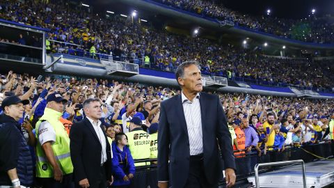 Miguel Angel Russo, head coach of Argentina's Boca Juniors, enters the field before a Copa Libertadores soccer match against Colombia's Independiente Medellin at La Bombonera stadium in Buenos Aires, Argentina, Tuesday, March 10, 2020. (AP Photo/Marcos Brindicci)