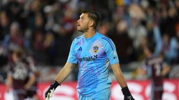 Los Angeles Galaxy goalkeeper John McCarthy looks at the video board after giving up a goal to Colorado Rapids midfielder Oliver Larraz in the first half of the second match of an MLS Cup opening-round playoff series Friday, Nov. 1, 2024, in Commerce City, Colo. (AP Photo/David Zalubowski)