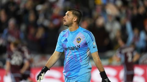 Los Angeles Galaxy goalkeeper John McCarthy looks at the video board after giving up a goal to Colorado Rapids midfielder Oliver Larraz in the first half of the second match of an MLS Cup opening-round playoff series Friday, Nov. 1, 2024, in Commerce City, Colo. (AP Photo/David Zalubowski)