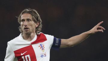 Croatia's Luka Modric reacts during the UEFA Nations League soccer match between Scotland and Croatia at Hampden Park in Glasgow, Scotland, Friday, Nov. 15, 2024. (AP Photo/Scott Heppell)