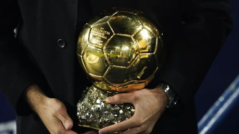 Manchester City's Rodri holds his Ballon d'Or (Golden Ball) award before the start of the English Premier League soccer match between Manchester City and Tottenham at the Etihad Stadium in Manchester, England, Sunday, Nov. 24, 2024. (AP Photo/Dave Thompson)