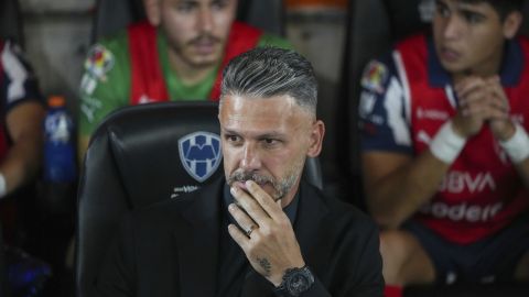 Monterrey's coach Martín Demichelis sits on the bench prior to the Mexican soccer league second-leg final match against America at BBVA stadium in Monterrey, Mexico, Sunday, Dec. 15, 2024. (AP Photo/Eduardo Verdugo)