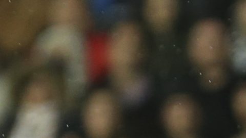 Real Madrid's Vinicius Junior, front, and Valencia's Andre Almeida battle for the ball during a Spanish La Liga soccer match at Mestalla stadium in Valencia, Spain, Friday, Jan. 3, 2025. (AP Photo/Alberto Saiz)