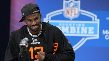 Colorado quarterback Shedeur Sanders speaks during a press conference at the NFL football scouting combine Friday, Feb. 28, 2025, in Indianapolis. (AP Photo/George Walker IV)