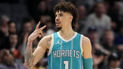 Charlotte Hornets guard LaMelo Ball celebrates after scoring against the Orlando Magic during the second half of an NBA basketball game, Tuesday, March 25, 2025, in Charlotte, N.C. (AP Photo/Chris Carlson)