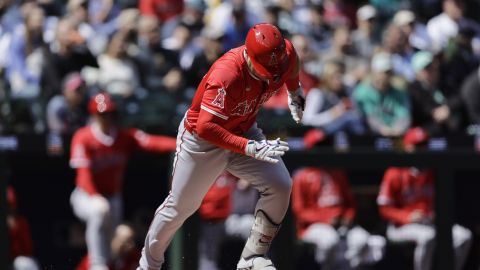 Los Angeles Angels' Mike Trout runs to first on a ground out against the Seattle Mariners during the third inning of a baseball game, Wednesday, April 30, 2025, in Seattle. (AP Photo/John Froschauer)