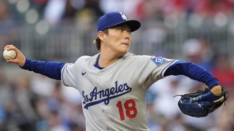 Los Angeles Dodgers pitcher Yoshinobu Yamamoto (18) works against the Atlanta Braves in the first inning of a baseball game, Friday, May 2, 2025, in Atlanta. (AP Photo/Mike Stewart)