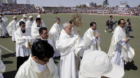 Pope Leo XIV, then Apostolic Administrator of Chiclayo Robert Prevost, attends a Corpus Christi celebration at a stadium in Chiclayo, Peru, Friday, June 19, 2015. (AP Photo/Julio Reano)
