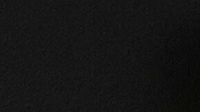 Alex Palou, of Spain, center, celebrates after winning the IndyCar Grand Prix auto race at Indianapolis Motor Speedway in Indianapolis, Saturday, May 10, 2025. Pato O'Ward, of Mexico, left, finished second and Will Power, of Australia, finished third. (AP Photo/Michael Conroy)