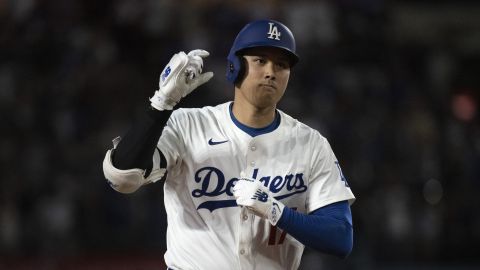 Los Angeles Dodgers' Shohei Ohtani celebrates his solo home run during the sixth inning of a baseball game against the Arizona Diamondbacks in Los Angeles, Monday, May 19, 2025. (AP Photo/Kyusung Gong)