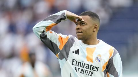 Real Madrid's Kylian Mbappe warms-up prior to a Spanish La Liga soccer match against Real Sociedad at Santiago Bernabeu stadium in Madrid, Saturday, May 24, 2025. (AP Photo/Cesar Cebolla)