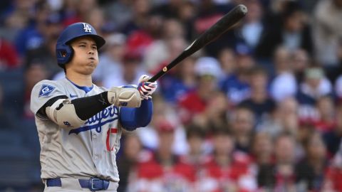 Los Angeles Dodgers' Shohei Ohtani reacts after swinging at a pitch during the second inning of a baseball game against the Cleveland Guardians, Monday, May 26, 2025, in Cleveland. (AP Photo/David Dermer)