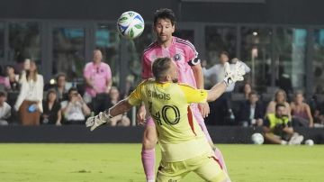 Inter Miami forward Lionel Messi scores goal against CF Montreal goalkeeper Jonathan Sirois (40) during the second half of an MLS soccer match, Wednesday, May 28, 2025, in Fort Lauderdale, Fla. (AP Photo/Lynne Sladky)