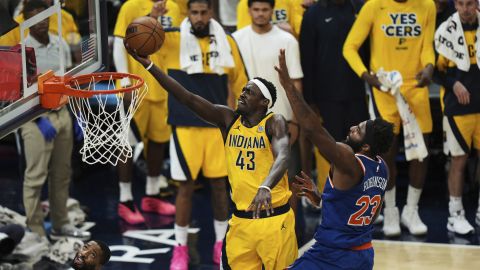 Indiana Pacers forward Pascal Siakam (43) shoots against New York Knicks center Mitchell Robinson (23) during the first half of Game 6 of the Eastern Conference finals of the NBA basketball playoffs in Indianapolis, Saturday, May 31, 2025. (AP Photo/AJ Mast)