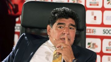 FILE - In this May 4, 2015 file photo, Argentina football legend Diego Maradona speaks on the second day of the SoccerEx Asian Forum conference in Southern Shuneh, Jordan. Journalist Victor Hugo Morales said on Twitter late Sunday, June 21, 2015 that Maradona plans to run for president of FIFA. (AP Photo/Raad Adayleh, File)