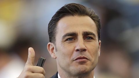 FILE - In this July 13, 2014 file photo, former Real Madrid and Juventus defender Fabio Cannavaro, from Italy, arrives to attend the World Cup final soccer match between Germany and Argentina at the Maracana Stadium in Rio de Janeiro, Brazil. Chinese Super League champions Guangzhou Evergrande appointed Cannavaro Wednesday, Nov. 5, 2014 as their new coach. Cannavaro replaces his former mentor Marcello Lippi, who on Sunday, Nov. 2, announced his decision to retire from football management and take over as Guangzhou technical director. (AP Photo/Hassan Ammar, File)