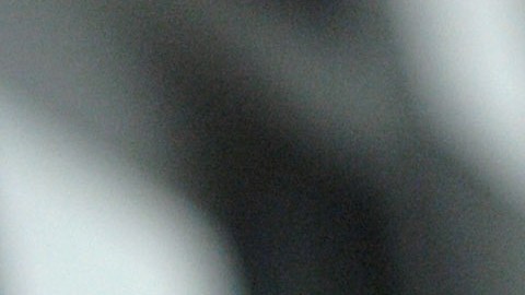 A man, detained for illegal border crossing, holds a bar in the detention center of the Hungarian Border Guard in Nyirbator, Hungary, near the Ukrainian border (260 km east of Budapest) April 12, 2007. ungary is prepared to reinforce its non-EU borders and will join the Schengen Agreement and its Information System (SIS), a central database, at the beginning of 2008. The Schengen system is an agreement among European states which allows the abolition of systematic border controls between the participating countries while they guard the external borders heavily. (AP Photo/Bela Szandelszky)