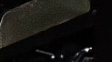 está acusado de asesinar a otro individuo durante un robo de automóvil el año pasado.