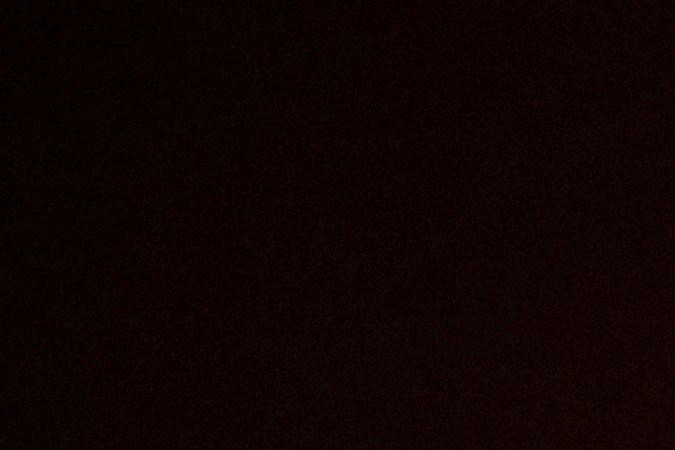 The Palisades Fire burns houses in the hill next to the Getty Villa Wednesday, Jan. 8, 2025 in Pacific Palisades, Calif. (AP Photo/Etienne Laurent)