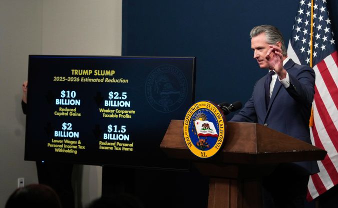 CORRECTS BUDGET YEARS Calif. Gov. Gavin Newsom presents his revised 2025-2026 state budget during a news conference in Sacramento, Calif., Wednesday, May 14, 2025. (AP Photo/Rich Pedroncelli)