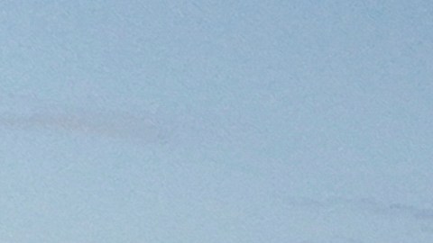 Motorists form a queue in a parking lot and along Pacific Coast Highway waiting to enter the Palisades Fire zone Tuesday, Jan. 28, 2025 in Santa Monica, Calif. (AP Photo/Jae C. Hong)